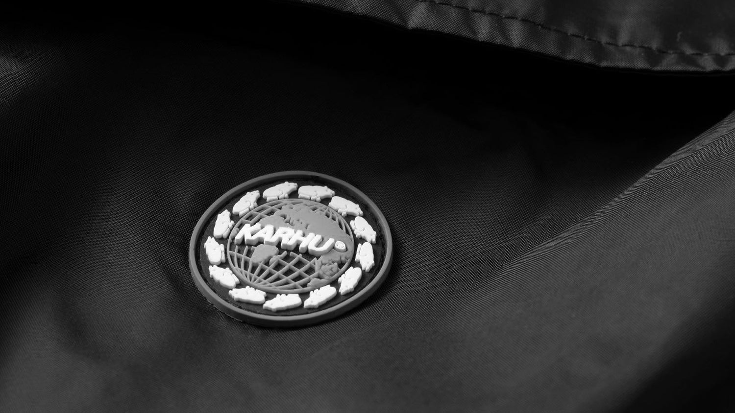 worldwide-coach-jacket-black-SPELLOUT-back