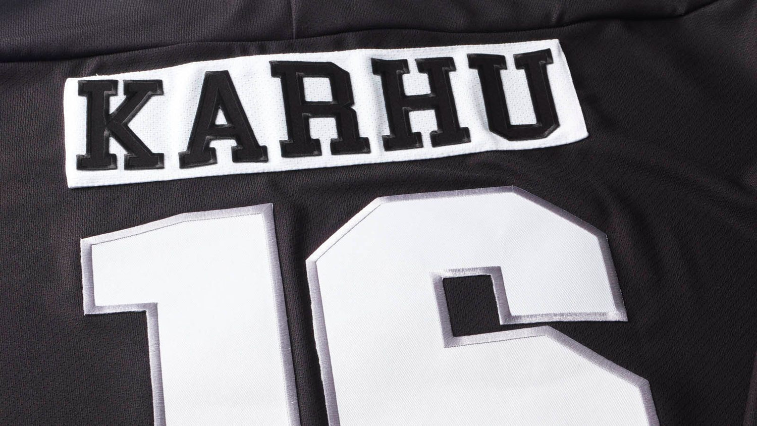 Karhu x tacla hockey jersey black purple heather detail back